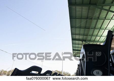 Empty stadium seating View Large Photo Image Stock Photo - Empty stadium seating. Fotosearch