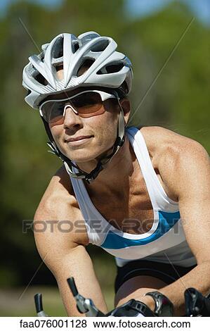 Female cyclist View Large Photo Image Stock Photo - Female cyclist. Fotosearch