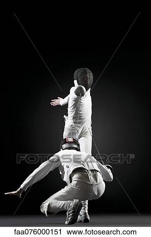 Fencers fencing View Large Photo Image Stock Image - Fencers fencing. Fotosearch