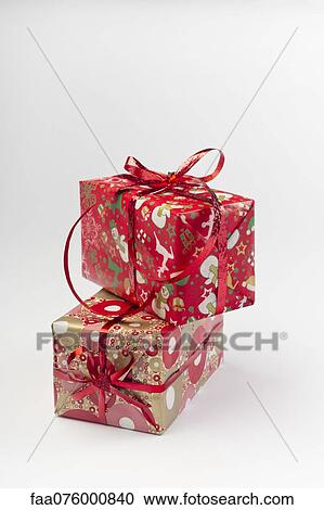 Festively wrapped Christmas gifts View Large Photo Image Stock Image - Festively wrapped Christmas gifts. Fotosearch