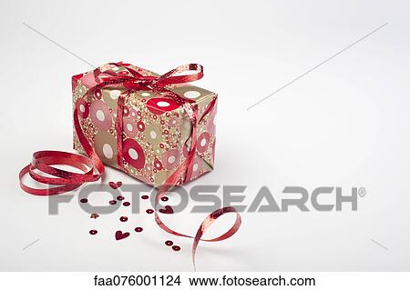 Picture - Festively wrapped gift. Fotosearch