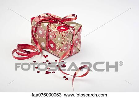 Festively wrapped gift View Large Photo Image Stock Image - Festively wrapped gift. Fotosearch