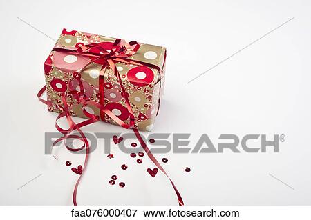 Festively wrapped gift View Large Photo Image Stock Photo - Festively wrapped gift. Fotosearch