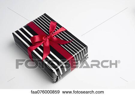 Stock Photo - Festively wrapped gift. Fotosearch