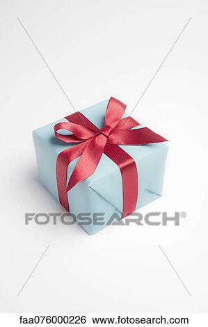 Stock Photograph - Festively wrapped gift. Fotosearch
