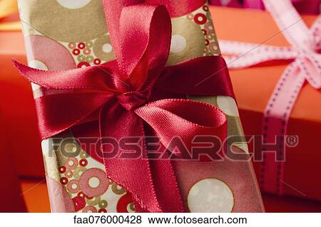 Stock Photo - Festively wrapped gifts. Fotosearch