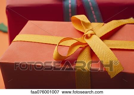Festively wrapped gifts View Large Photo Image Stock Photo - Festively wrapped gifts. Fotosearch