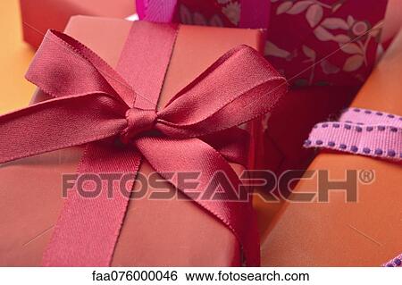 Festively wrapped gifts View Large Photo Image Stock Photograph - Festively wrapped gifts. Fotosearch