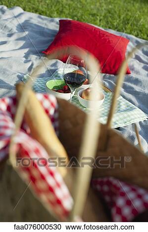 Food and drink on picnic blanket View Large Photo Image Stock Image - Food and drink on picnic blanket. Fotosearch