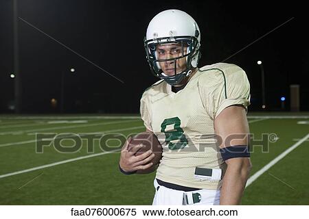 Football player on field, portrait View Large Photo Image Stock Photography - Football player on field, portrait. Fotosearch