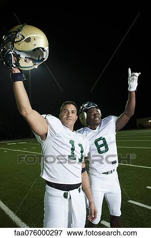 Stock Photo - Football players celebrating victory. Fotosearch