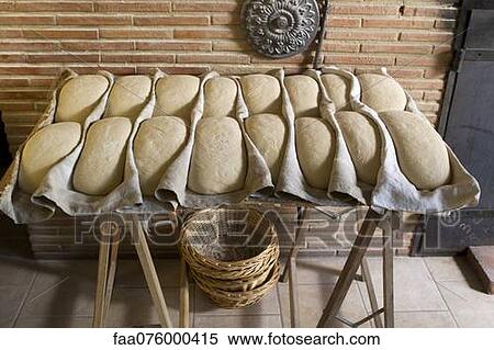 Stock Photography - Fresh bread dough waiting to be baked. Fotosearch