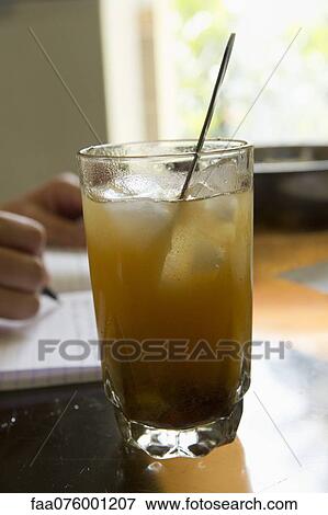 Glass of tamarind juice View Large Photo Image Stock Photo - Glass of tamarind juice. Fotosearch