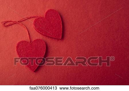 Heart ornaments on red background View Large Photo Image Stock Image - Heart ornaments on red background. Fotosearch
