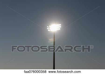 Illuminated floodlights View Large Photo Image Stock Photo - Illuminated floodlights. Fotosearch