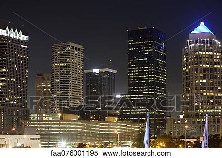 Stock Photography - Illuminated office buildings at night. Fotosearch
