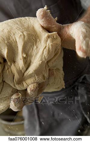 Kneading bread dough, cropped View Large Photo Image Stock Photo - Kneading bread dough, cropped. Fotosearch