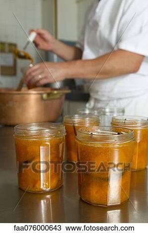 Stock Image - Making plum jam. Fotosearch