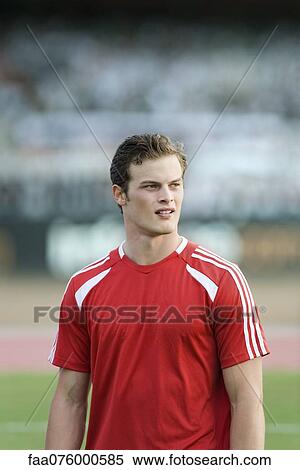Stock Photography - Male soccer player, portrait. Fotosearch
