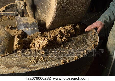 Milling machine grinding walnuts View Large Photo Image Stock Image - Milling machine grinding walnuts. Fotosearch