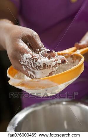 Preparing fresh coconut View Large Photo Image Stock Photo - Preparing fresh coconut. Fotosearch