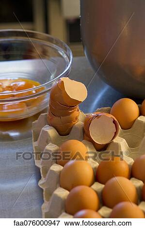 Stock Photo - Preparing fresh eggs. Fotosearch
