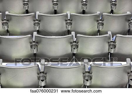 Rows of chairs, rear view View Large Photo Image Stock Image - Rows of chairs, rear view. Fotosearch