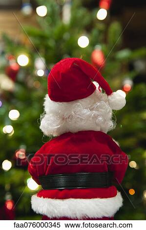 Santa Claus Christmas decoration, rear view View Large Photo Image Stock Photography - Santa Claus Christmas decoration, rear view. Fotosearch