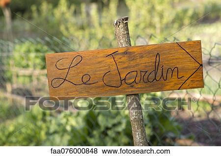 Sign showing way to garden View Large Photo Image Stock Photo - Sign showing way to garden. Fotosearch