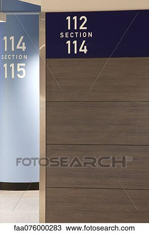 Stock Image - Signs with section number in stadium. Fotosearch