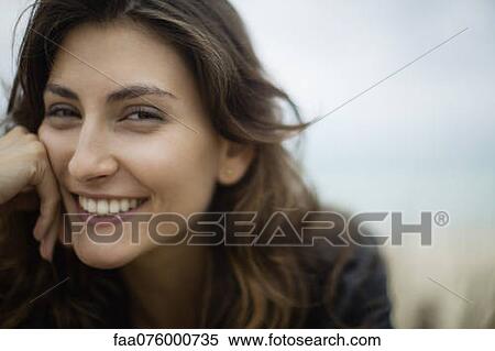 Stock Photography - Smiling young woman. Fotosearch