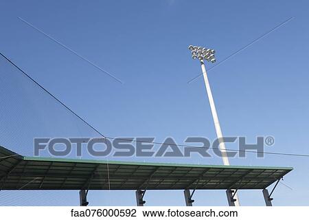 Stadium floodlights and netting View Large Photo Image Stock Image - Stadium floodlights and netting. Fotosearch