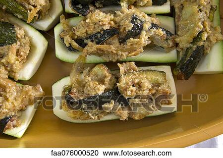 Stock Image - Stuffed zucchinis. Fotosearch