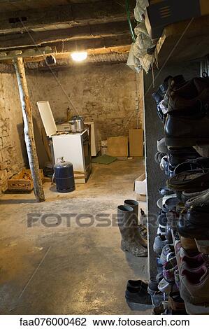 Stock Image - Unfinished basement. Fotosearch