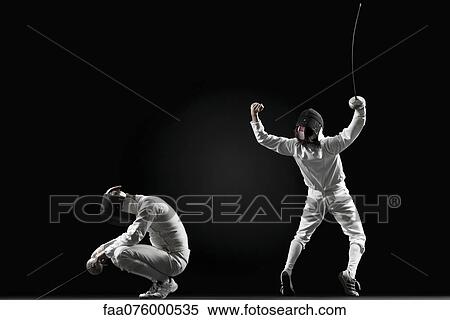 Winning fencer celebrating over defeated fencer View Large Photo Image Stock Photography - Winning fencer celebrating over defeated fencer. Fotosearch