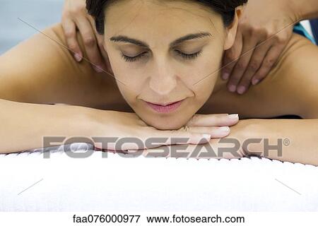Woman getting a massage View Large Photo Image Stock Photo - Woman getting a massage. Fotosearch