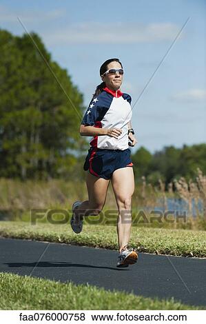 Woman running, portrait View Large Photo Image Stock Photo - Woman running, portrait. Fotosearch