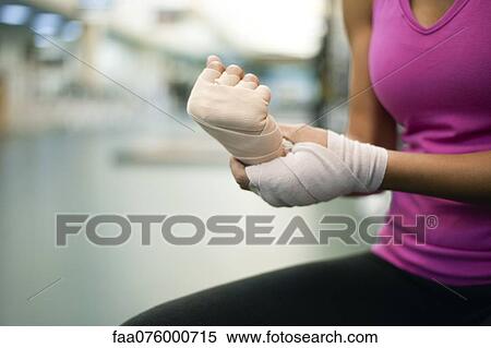 Stock Photography - Woman with bandaged hands, cropped. Fotosearch