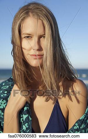 Stock Image - Young woman in bikini, portrait. Fotosearch