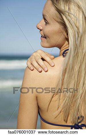 Stock Photo - Young woman in bikini. Fotosearch