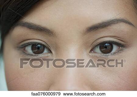 Young woman's eyes, close-up View Large Photo Image Stock Photo - Young woman's eyes, close-up. Fotosearch