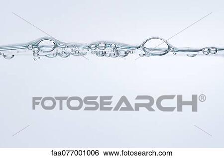 Stock Photograph - Bubbles on surface of water. Fotosearch