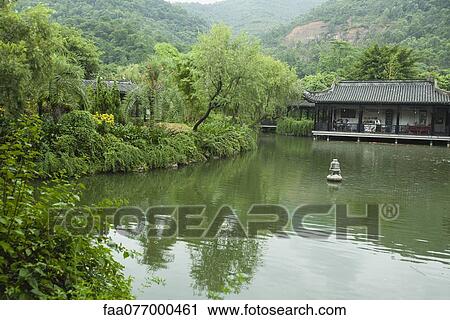 China, tranquil lake scene, restaurant in background View Large Photo Image Stock Image - China, tranquil lake scene, restaurant in background. Fotosearch