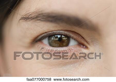 Close-up of woman's eye, cropped View Large Photo Image Stock Photo - Close-up of woman's eye, cropped. Fotosearch