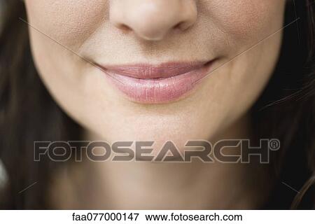 Close-up of woman's smiling lips View Large Photo Image Stock Photo - Close-up of woman's smiling lips. Fotosearch