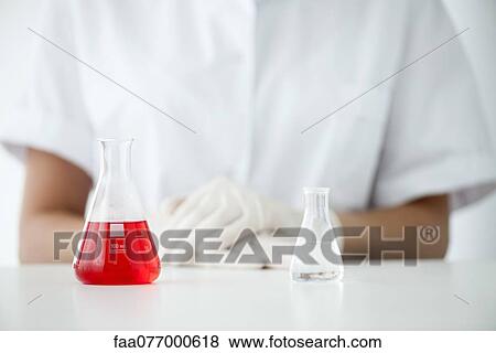Conical flasks in laboratory View Large Photo Image Stock Photo - Conical flasks in laboratory. Fotosearch