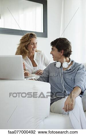 Stock Image - Couple at home. Fotosearch