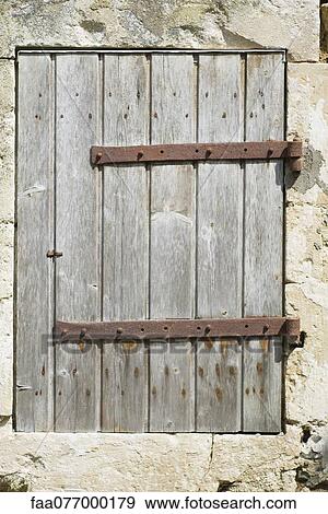 Stock Photo - Dilapidated wooden door. Fotosearch