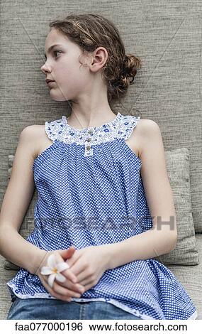 Stock Photograph - Girl daydreaming. Fotosearch