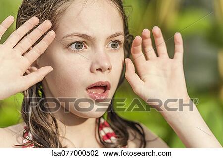 Stock Image - Girl with surprised expression. Fotosearch